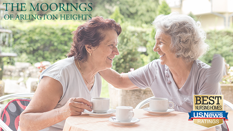 Two The Moorings of Arlington Heights residents enjoy spending time together in the retirement community. 