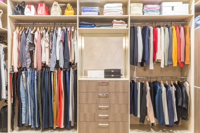 Organized closet with tiered shelving